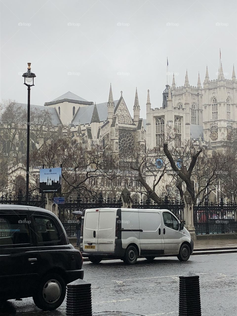A misty and foggy shot of the back of Westminister Abbey on a calm morning in April. 