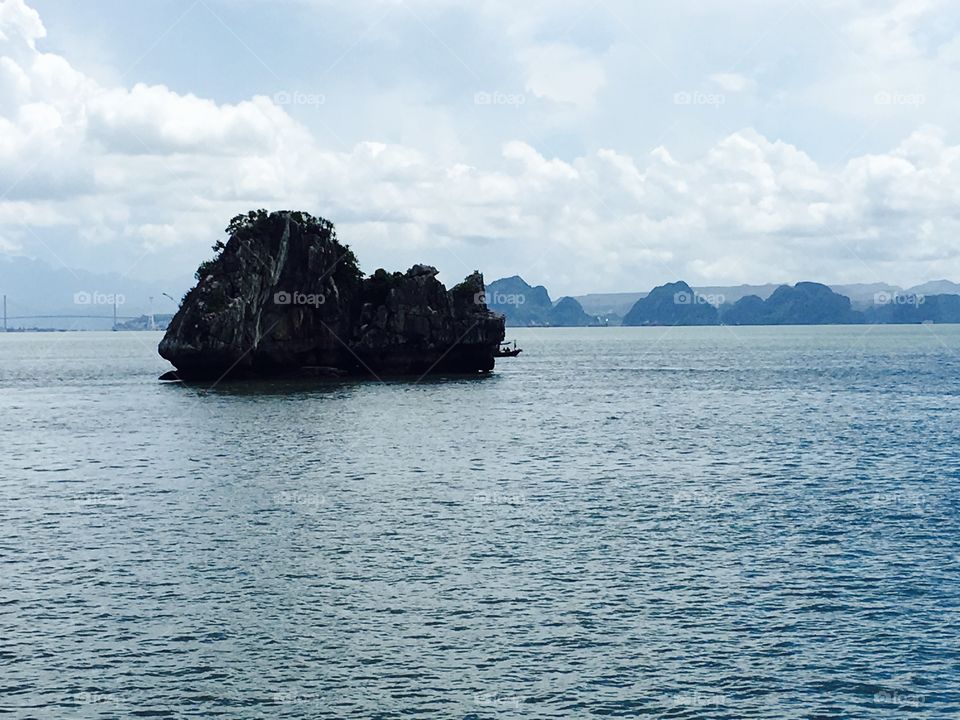 The fighting cocks rock formation in Halong bay Vietnam 
