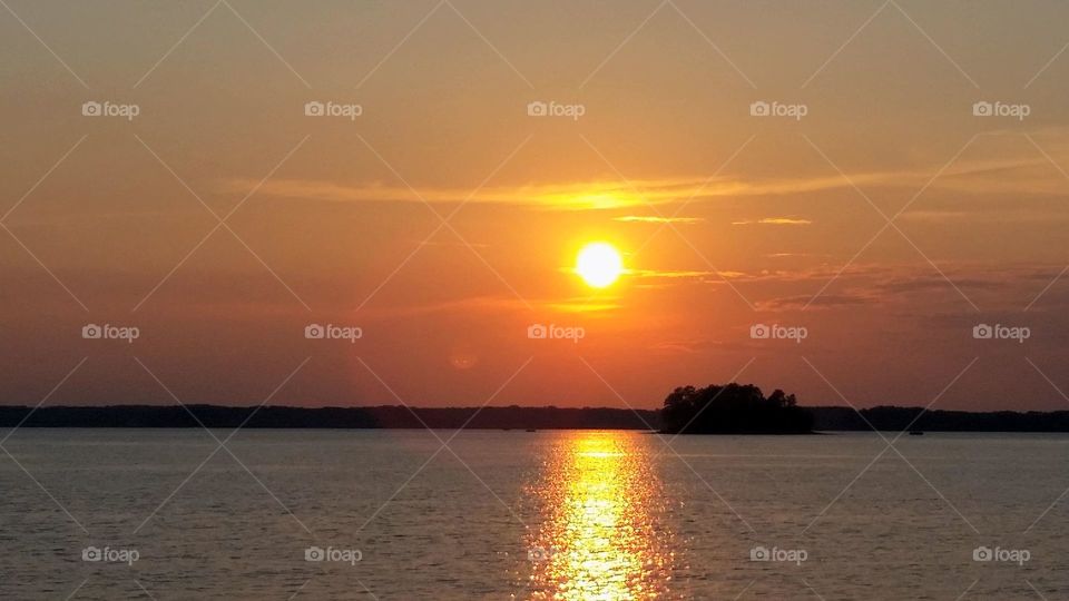 golden, shimmering sunset over Lake Hartwell