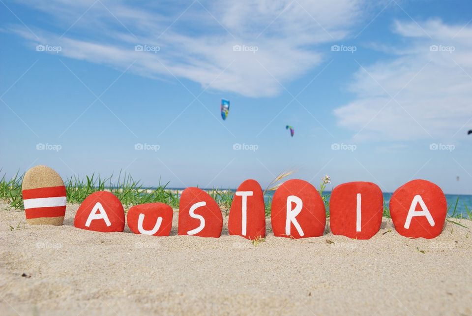 Austria, souvenir on stones on the beach