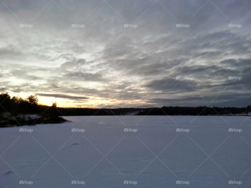 Evening Sky over The Frozen Lake
