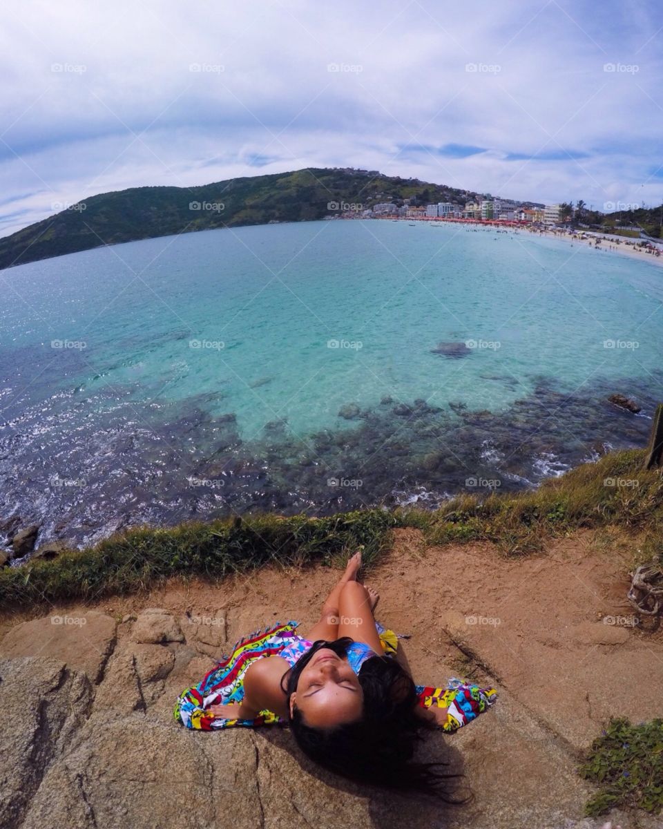 Scenic view of sea against cloudy sky