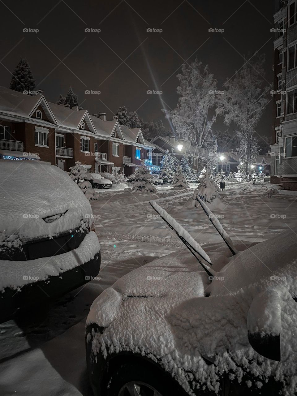 Winter street in town  at snowy night