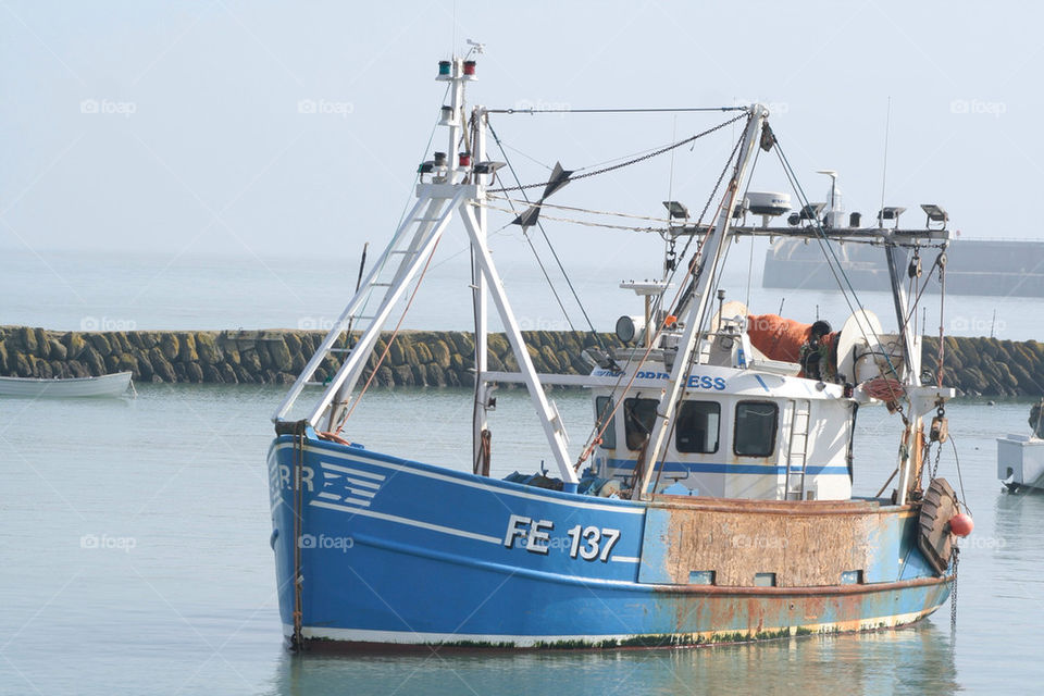 blue sunny boat harbour by dannytwotaps