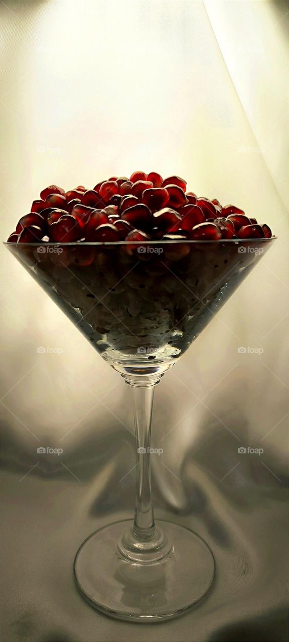 Glass with pomegranate