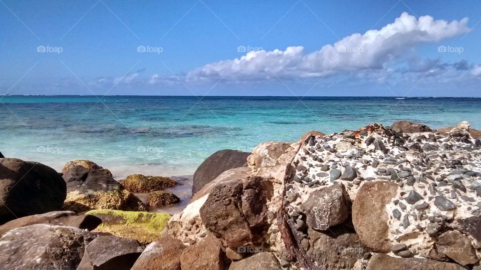 The Distancing Waters of the Caribbean from Flamenco Beach. Taken in December 2014 at Flamenco Beach on the island of Culebra, Puerto Rico. Since it's named the 3rd Most Beautiful Beach in the World by Discovery Channel, we went and weren't disappointed. 