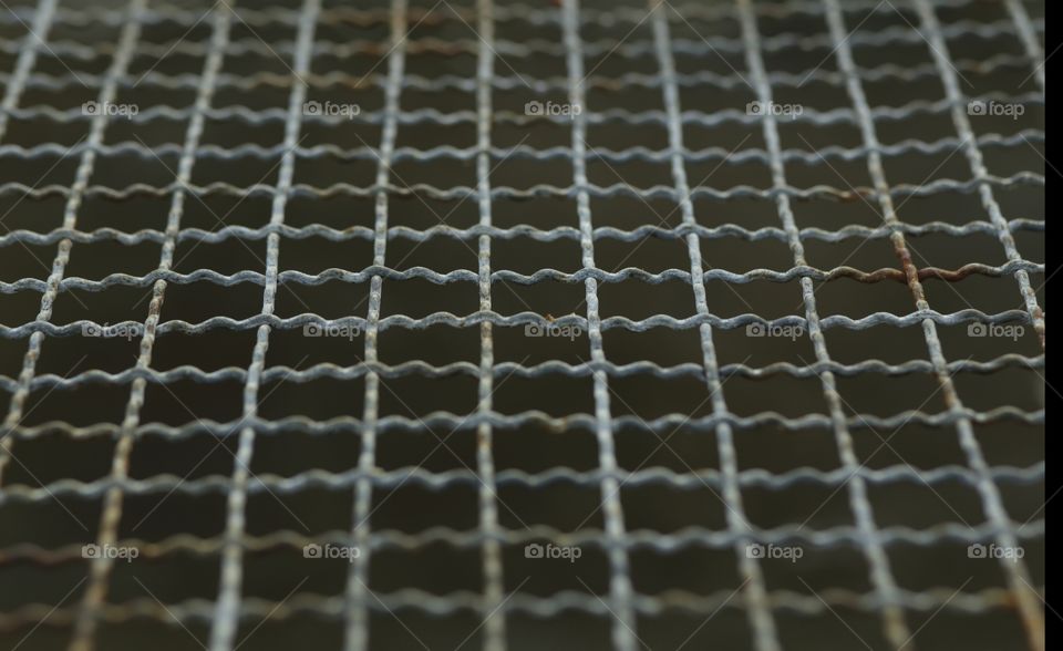 metal grill texture selective focus