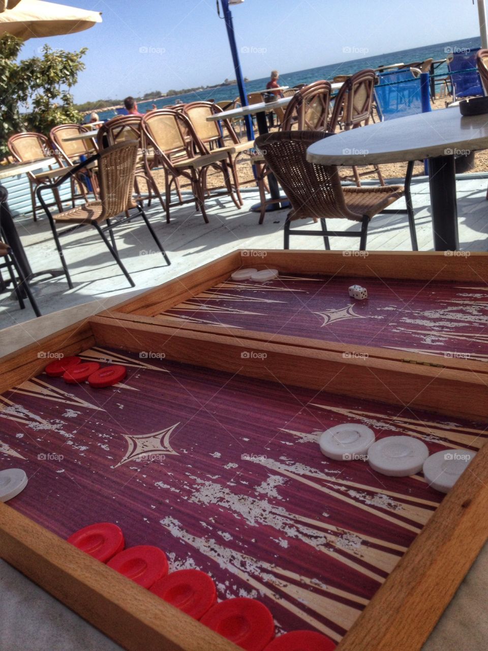 Playing backgammon at the beach