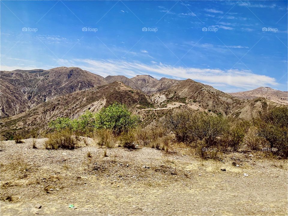 A drive through the “Andes” mountains leads to the small town of “Uyuni” on the outskirts of the “Uyuni Salt Flats”, a 4,248 square miles big salt flat, the leftover of a huge prehistoric lake. 2022. Hypnotic Productions