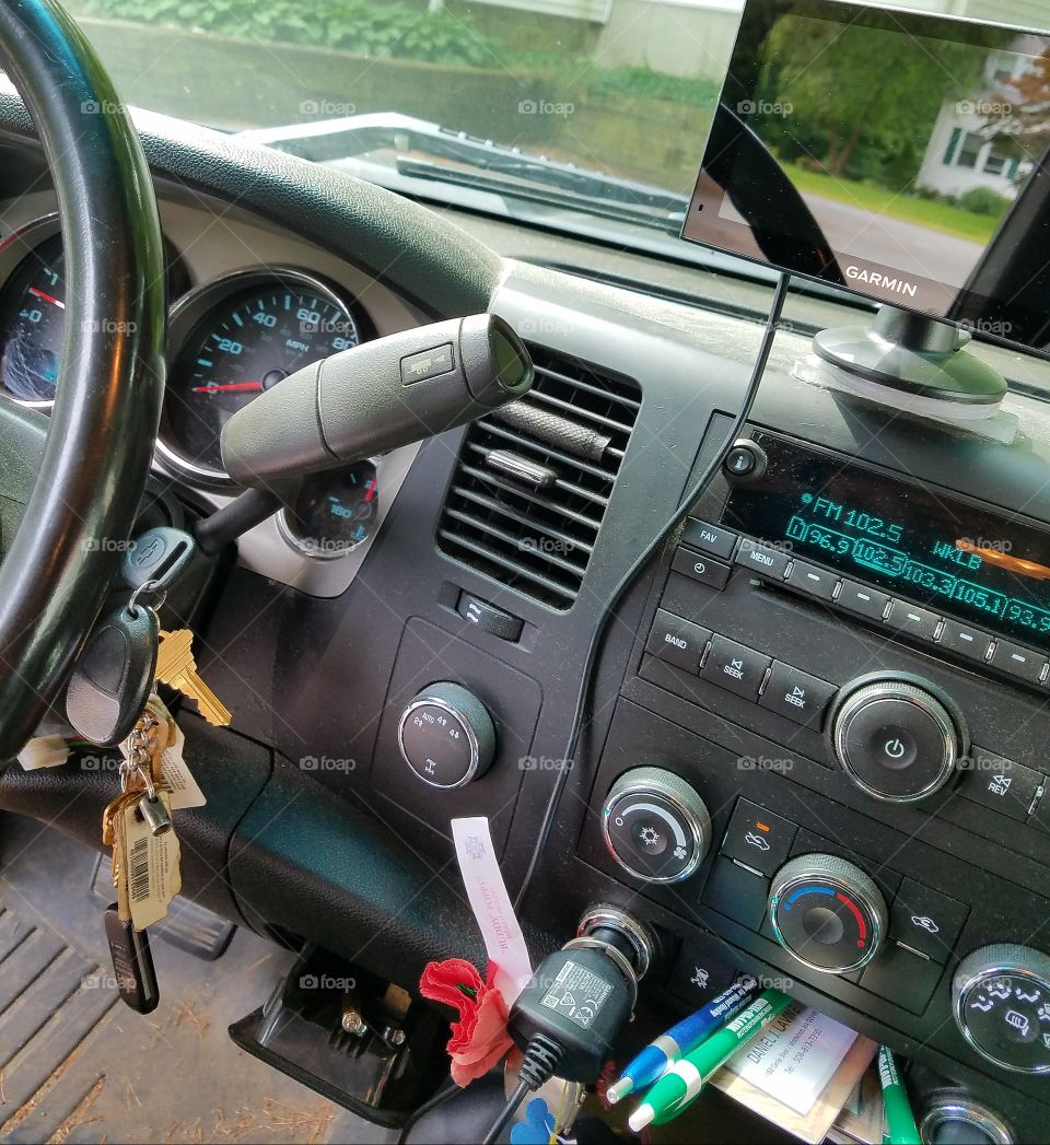 Working mans truck interior front    of the seat & dashboard areas.