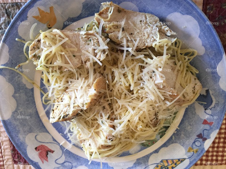 Plated chicken and Angel Hair Pasta