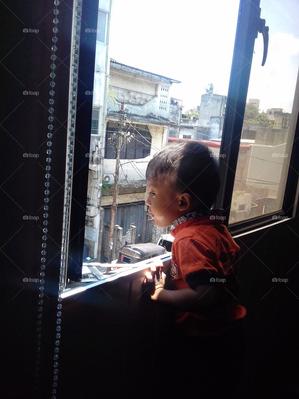 Cute Baby Looking Out Side..