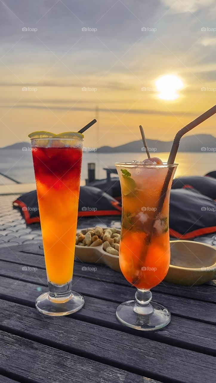 jucie and cocktail at the beach