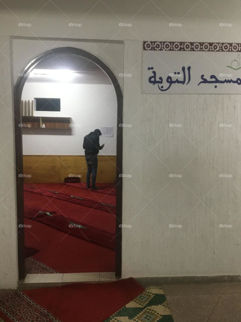 The name of the mosque and its open door
