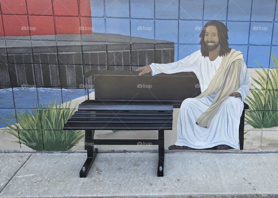mural of Jesus invites you to join him