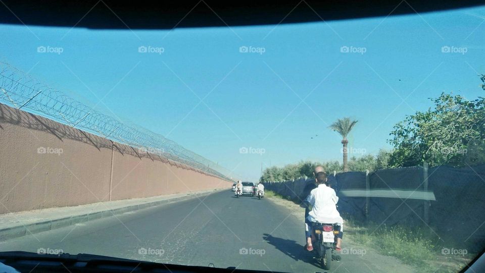 an adult man on his Motocycle