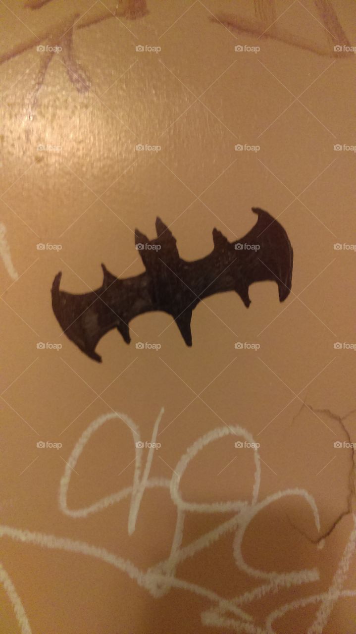 Batman graffiti bathroom door