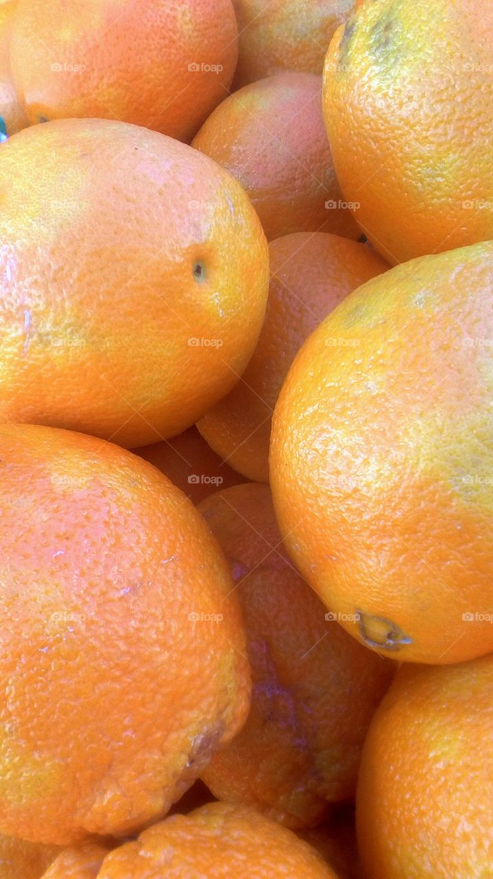 Big fresh oranges in closeup
