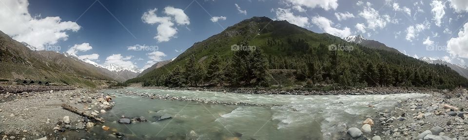 Beautiful panoramic view of Baspa river and mountains at Chitkul, Kinnaur Valley, Himachal, India.