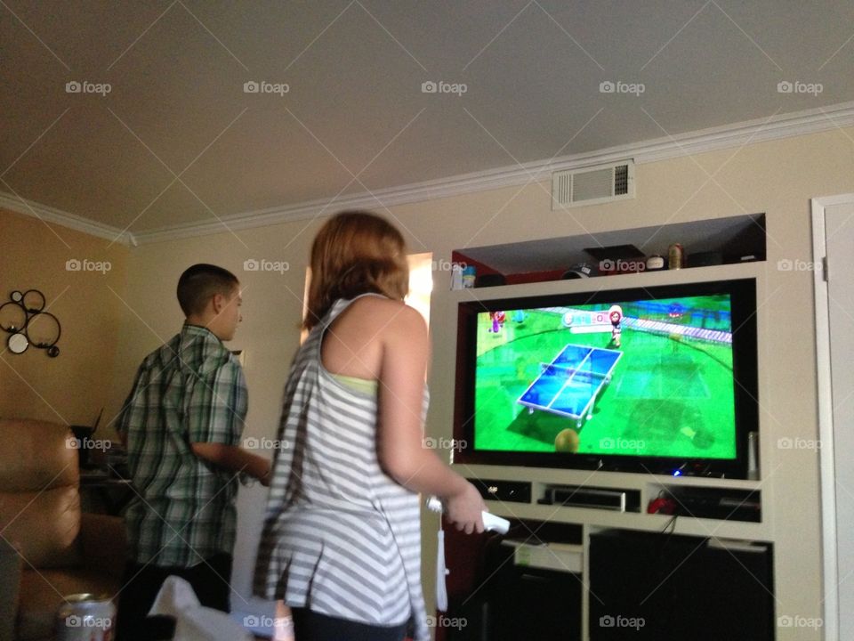 Kids playing video game 