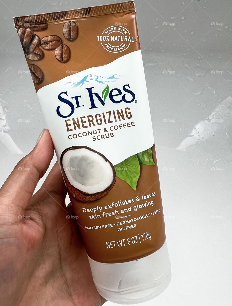 St. Ives energizing coconut and coffee scrub with white background.