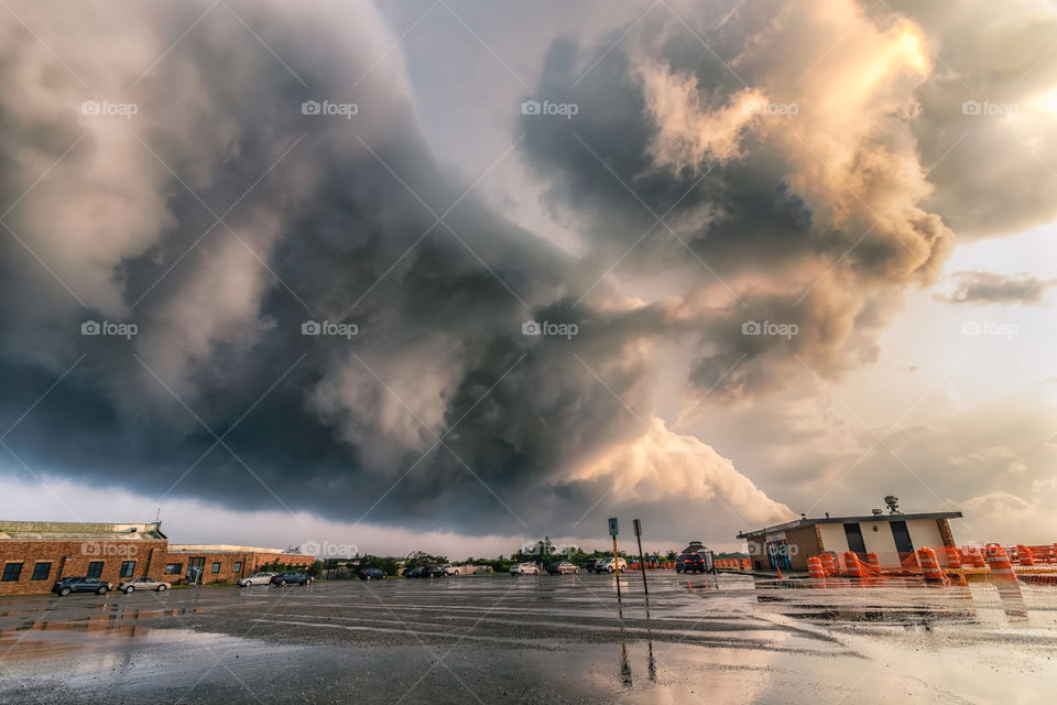 Massive shelf cloud over a a state beach parking field. Dramatic storm system 