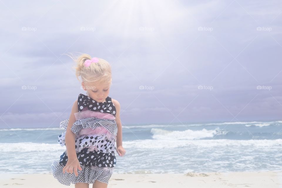 Little girl at the beach 
