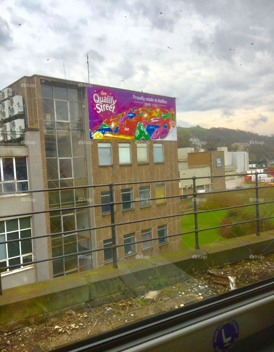 View from a train , Halifax , England , the sweet factory