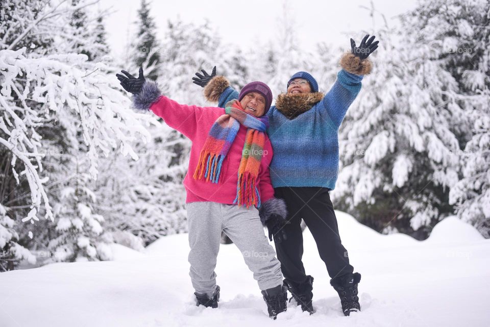 Tropical people enjoying their first winter experience.