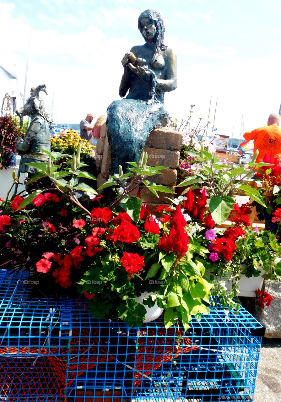 Flowers near statue