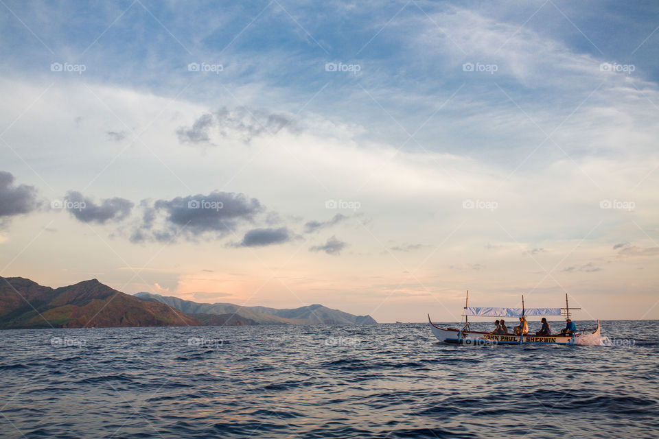 boatmen on sea