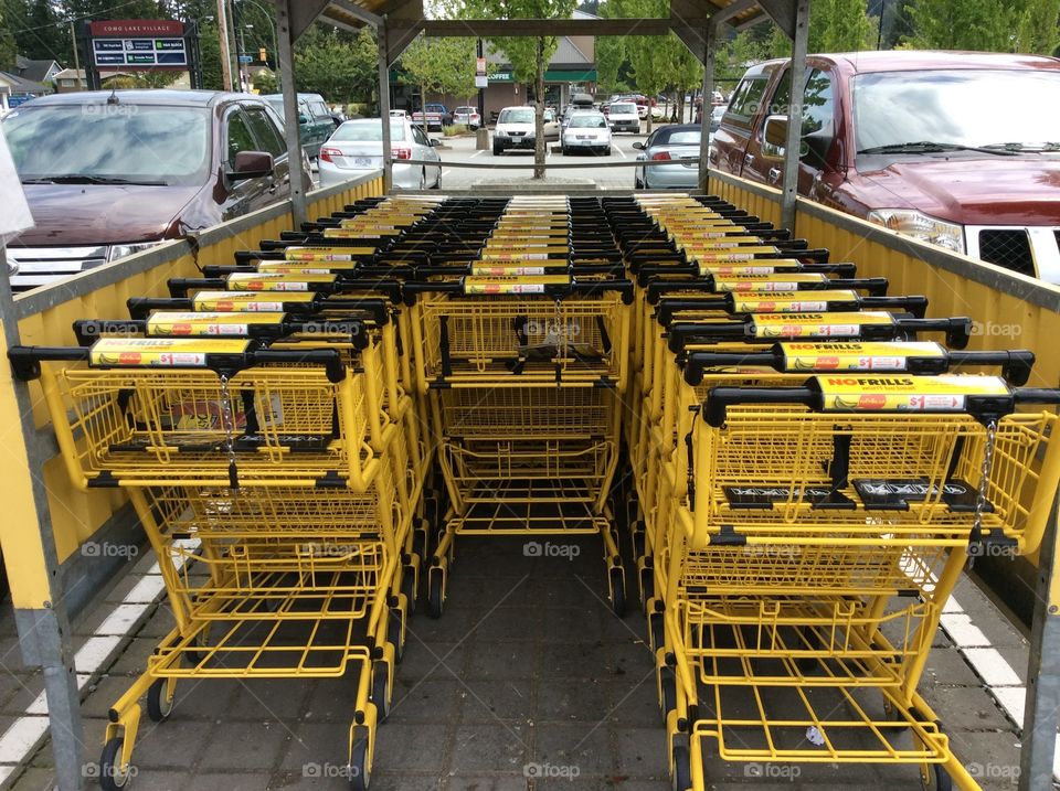 Yellow shopping carts trolleys. Unusual to see these in yellow! 