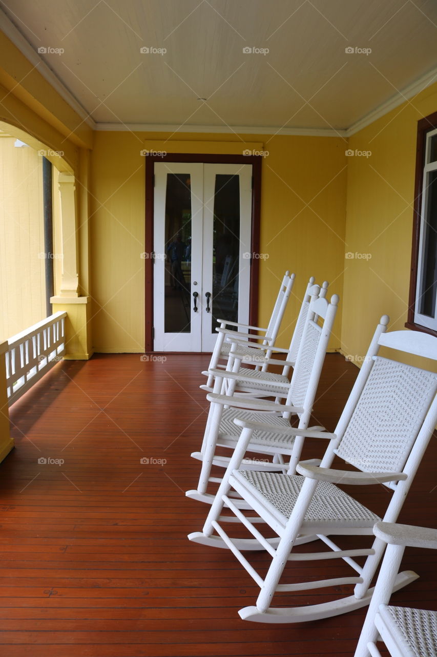 Yellow Summer Porch with Rocking Chairs