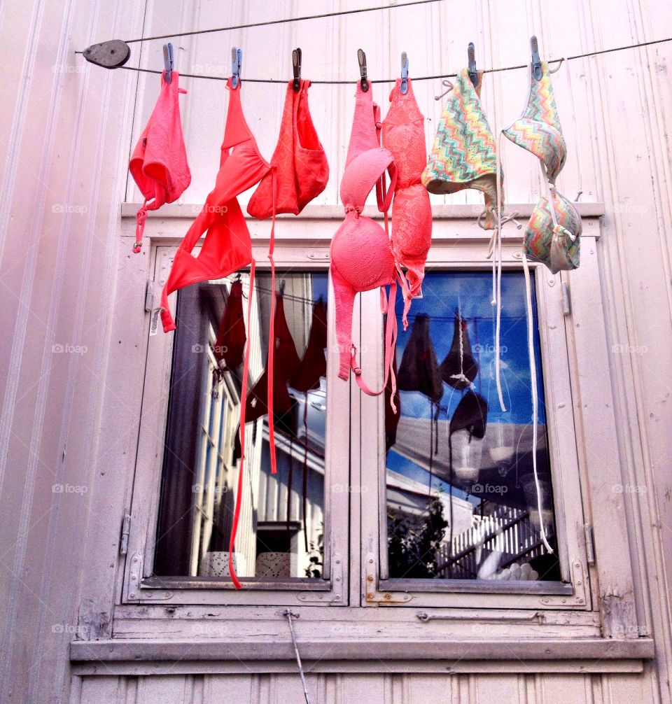 Summer, Risør Norway. Bikinis drying in the summer wind