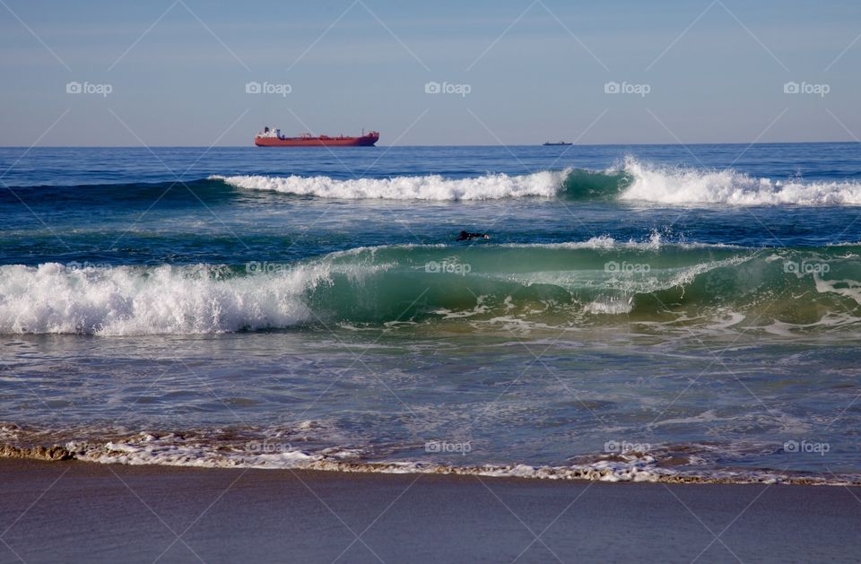 Ship sailing along the coast. Seascape and traffic along the Norwegian coast. 