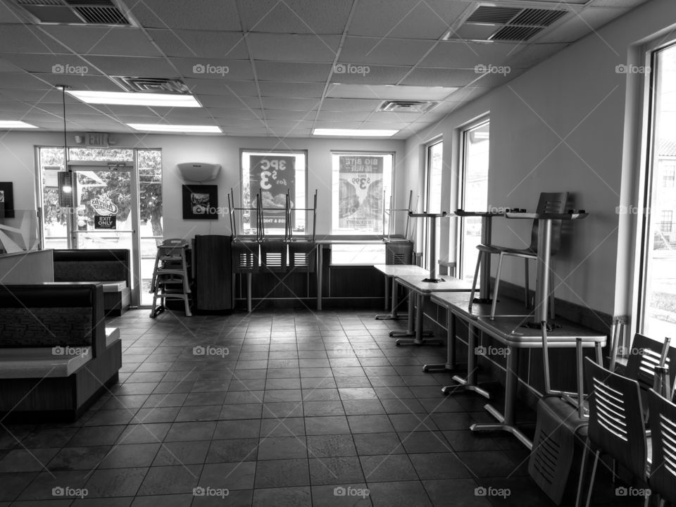 Empty dining area at fast food restaurant 