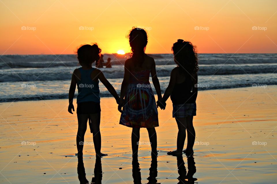 Three peas in a pod. The sisters lived in the next village from the beach. Their mother gracious let me snap some photos of them.