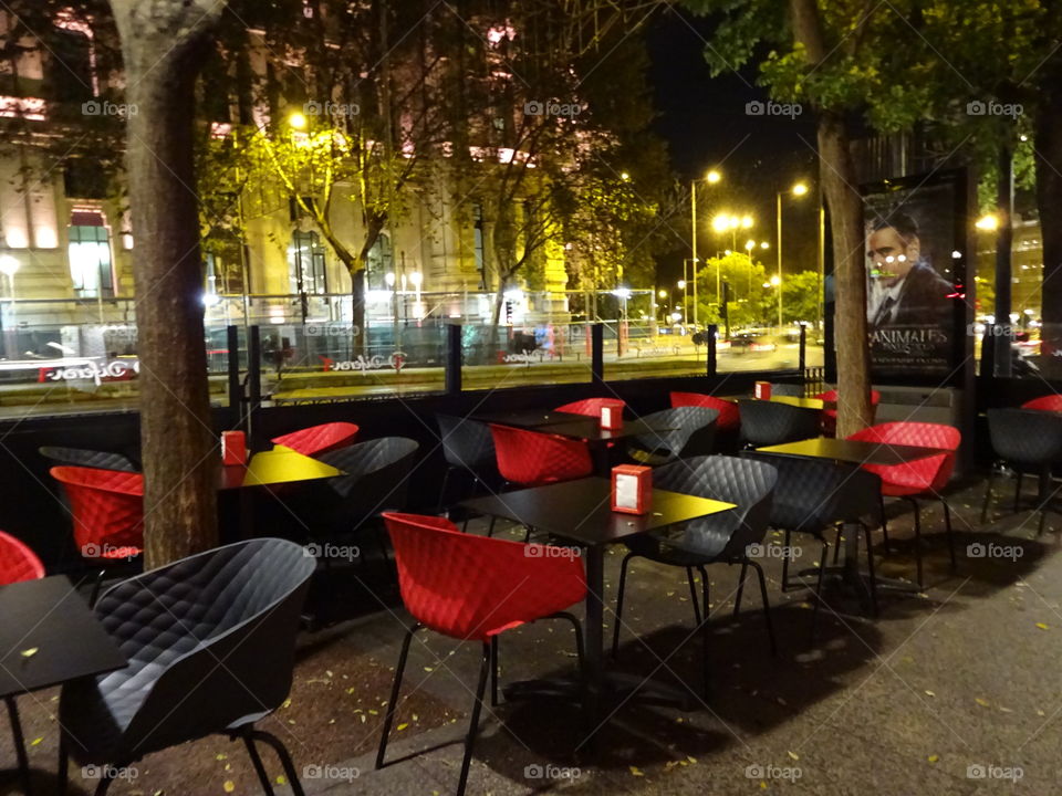 black and red tables in the street