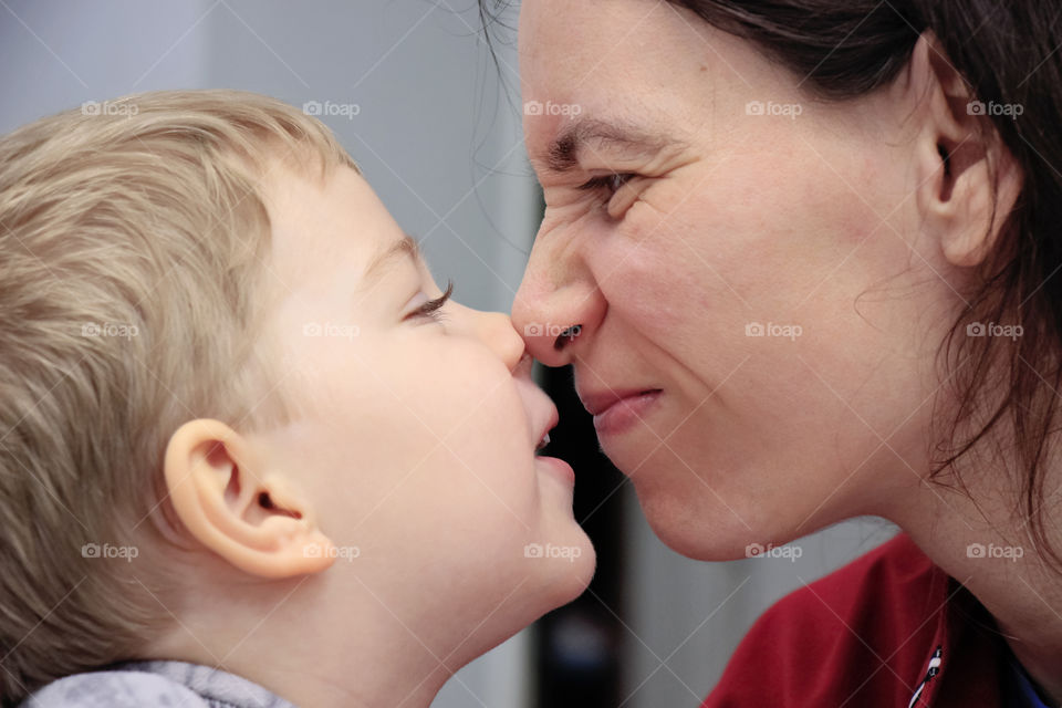 Playful mom and son