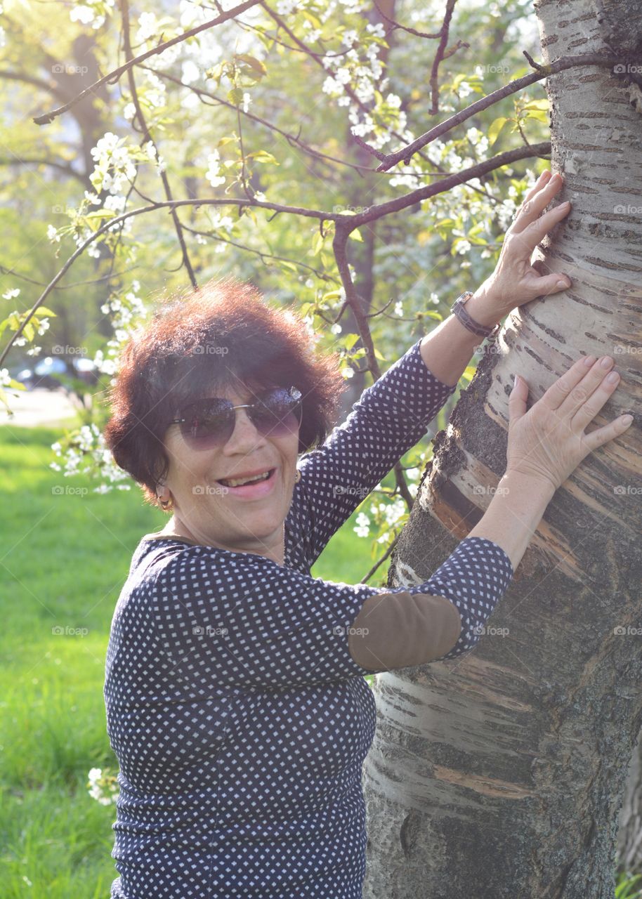 woman smiling spring blooming time nature lover