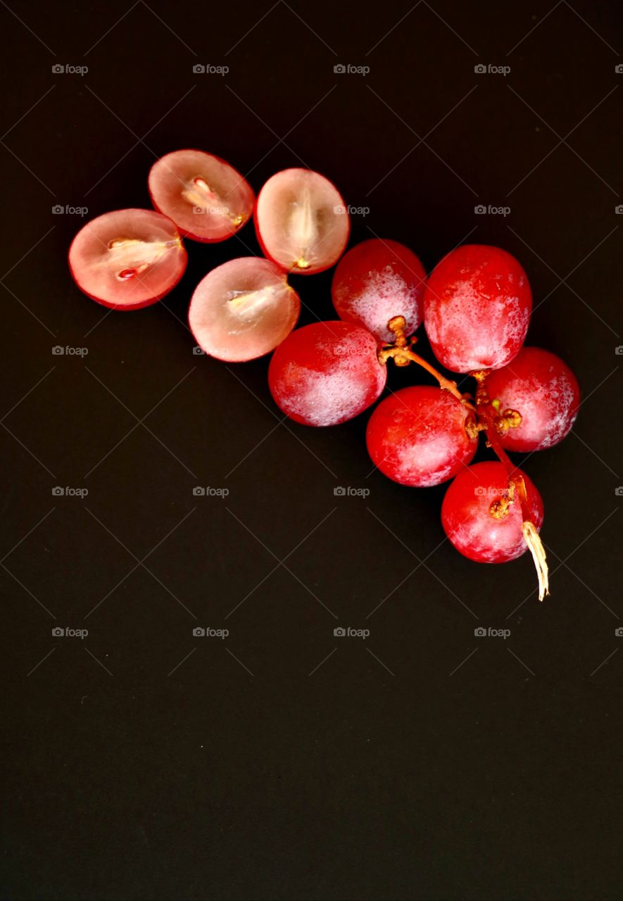 Top view to fresh and ripe red grape. Healthy lifestyle. Copy space.