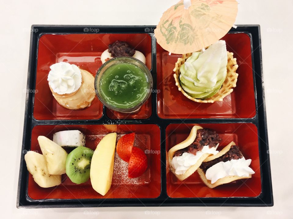 Summertime Ice Cream : Soft ice cream with fresh fruit and dessert serving on bento Japanese style 