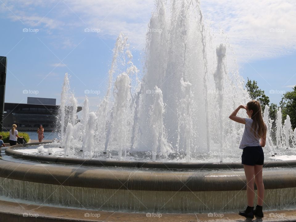 Girl and fountain 