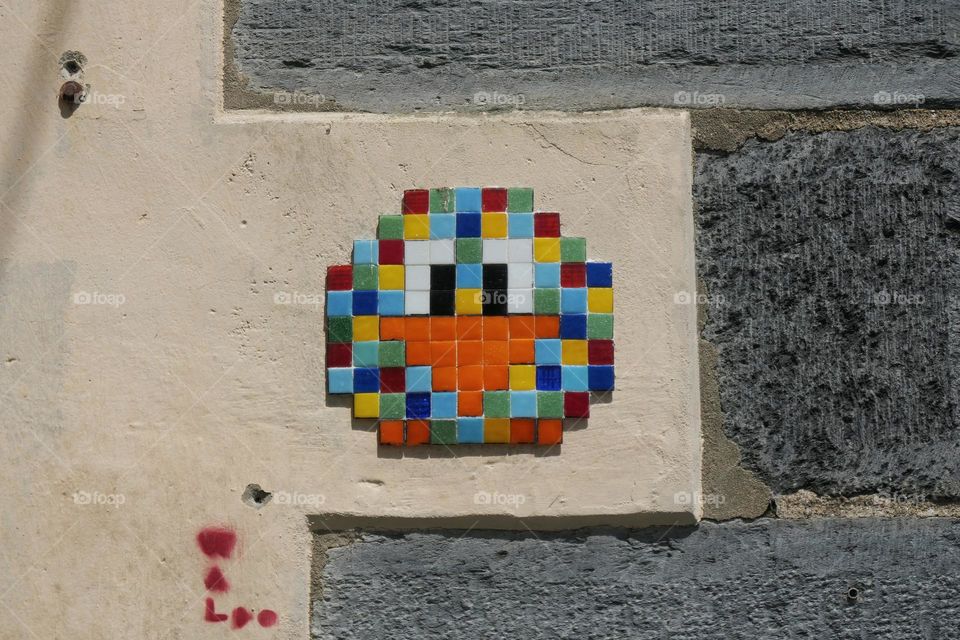 Bird in mozaic on a wall