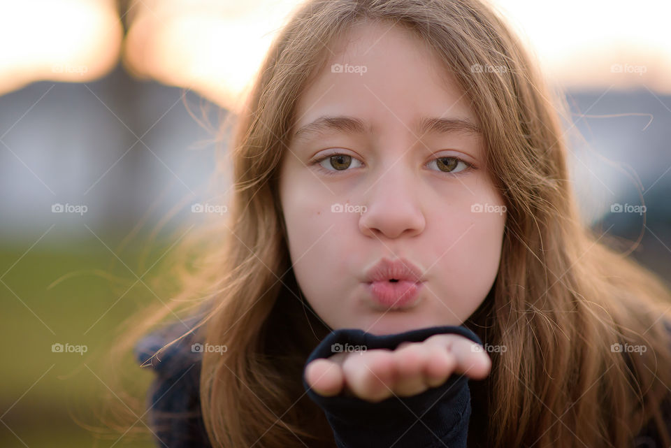 Blowing kisses