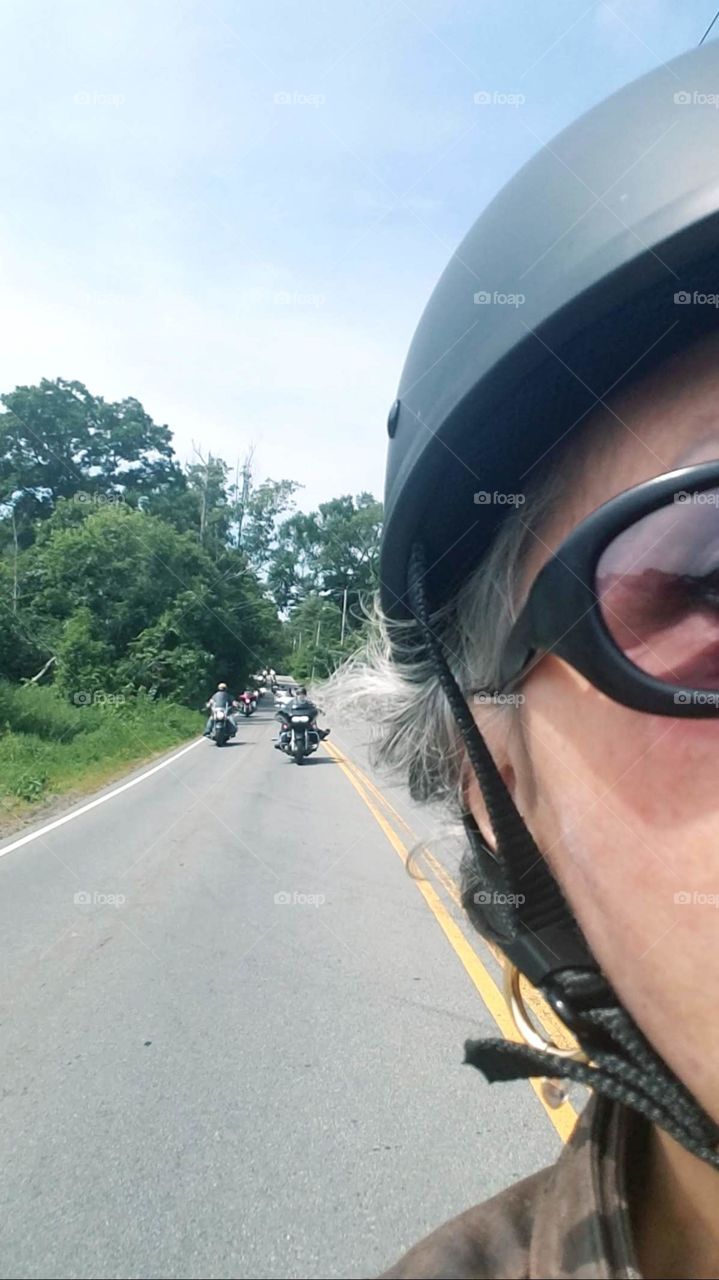 Summer activities in USA! Motorcycle riding with your friends. Selfie type photo from passenger seat🏍😎