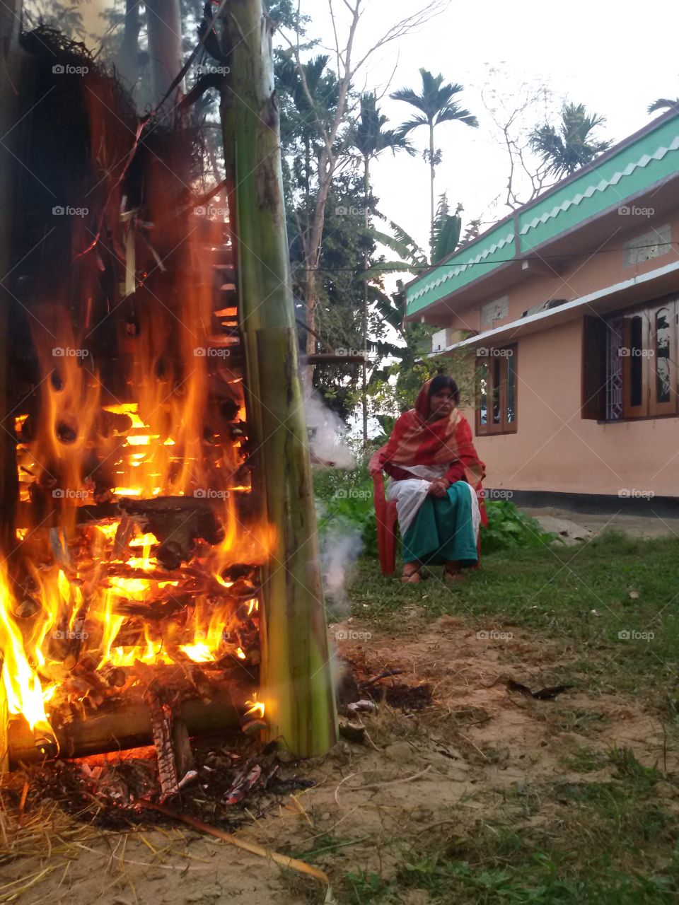 Mom and fire of Maagh bihu at home