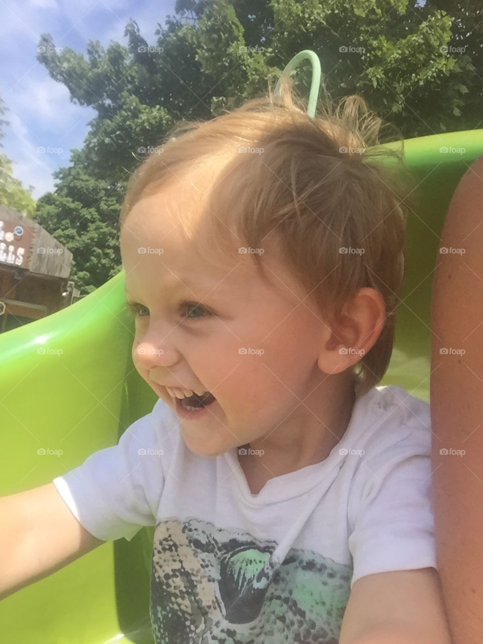 My son experiencing the thrill of his first roller coaster. 