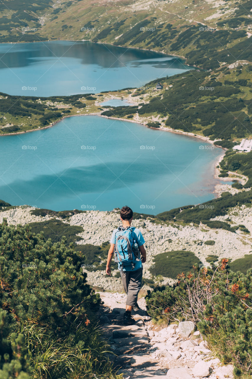 Man exploring the idyllic lake