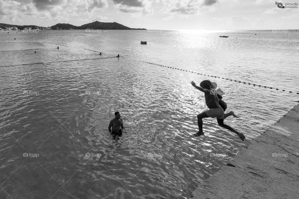 "C'mon! Daddy is looking after you"

Kids playing and enjoying the hot summer day, over an old pier at Grand Case beach, Saint Martin.

http://www.picardo.photography/Portfolio/Street-photography/i-GxDGn6c/A